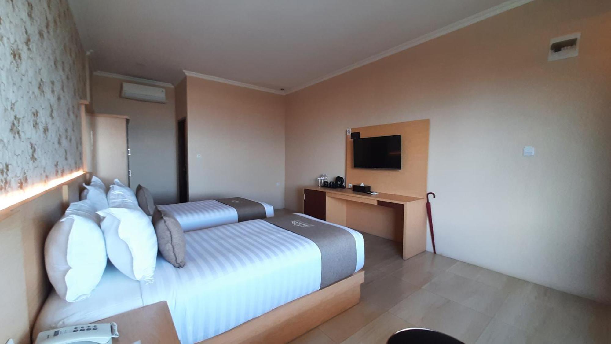 Bukit Indah Doda Hotel & Resorts Palu Phòng bức ảnh